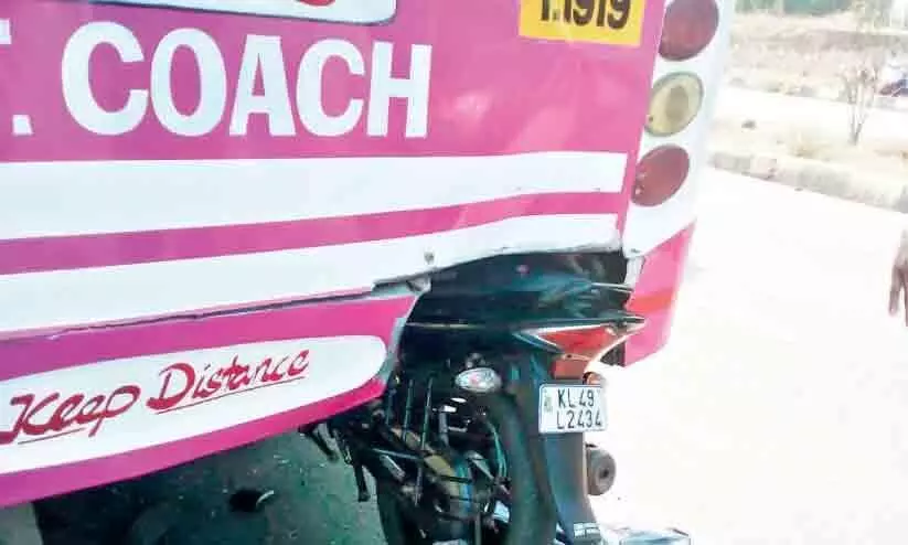 bike collided with the bus and one person was injured