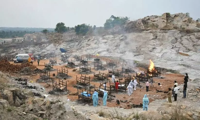 Bengaluru crematoriums running out of space, pyres burn at granite quarry outside city