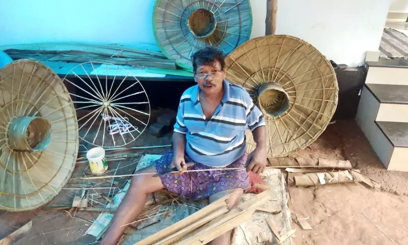 hat umbrella maker ramankutty