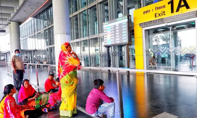 relatives waiting outside the airport