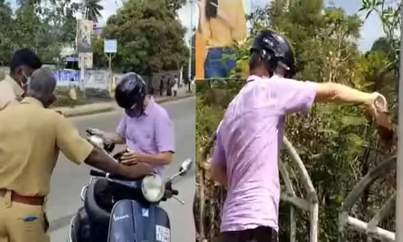 മദ്യം വാങ്ങിയ വിദേശിയെ പൊലീസ്​ തടഞ്ഞു; ഒഴുക്കികളഞ്ഞ് പ്രതിഷേധം