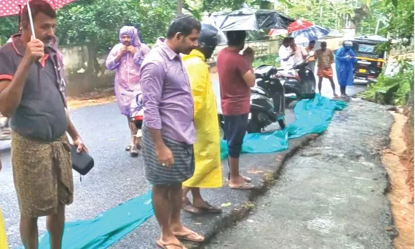 കനത്ത മഴയിൽ റോഡ് കോൺക്രീറ്റ് പ്രവൃത്തി: പ്രതിഷേധവും സംഘർഷാവസ്ഥയും