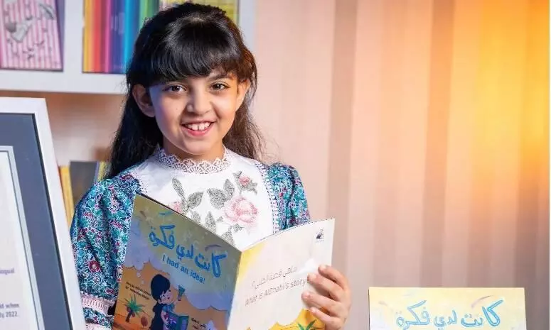 Eight-year-old girl sets world record by writing book in two languages