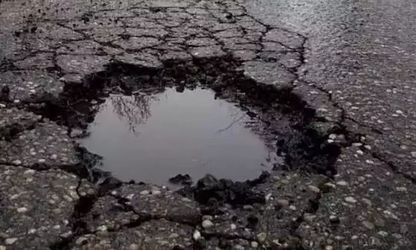 potholes on road