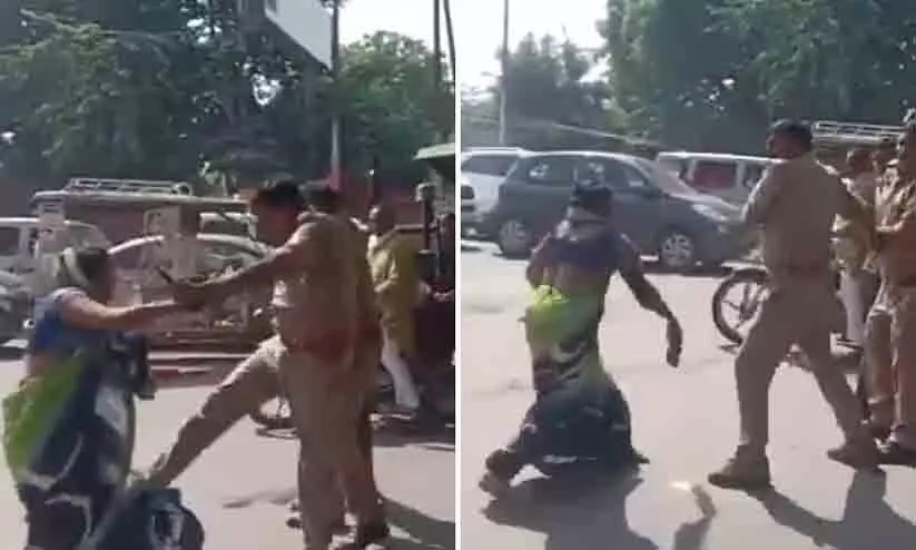 woman thrased policeman with slippers in UP