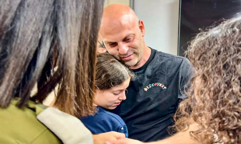 Relative of freed Israeli girl Hila Shoshani  embracing