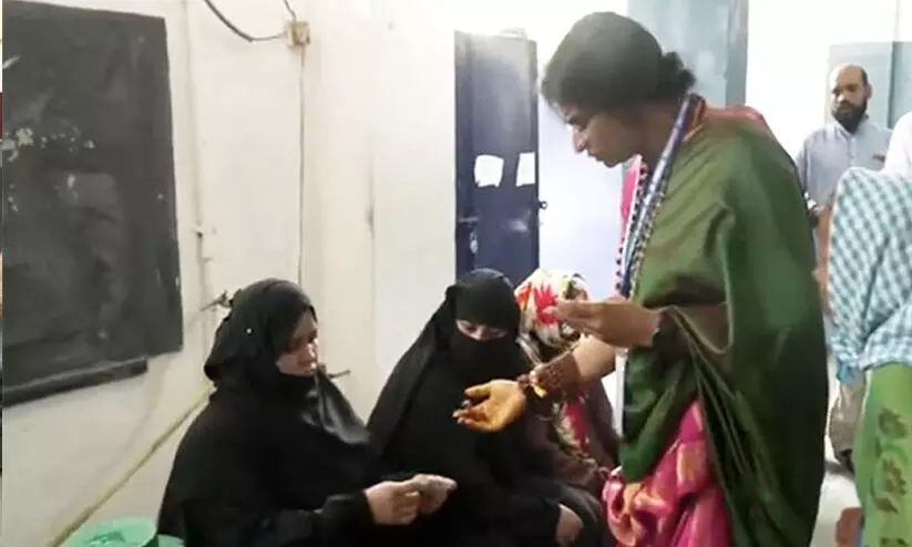 BJP’s Madhavi Latha verifies identities of Hyderabad women in ‘burqa