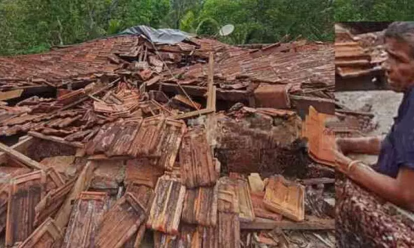 house broken by wind and rain