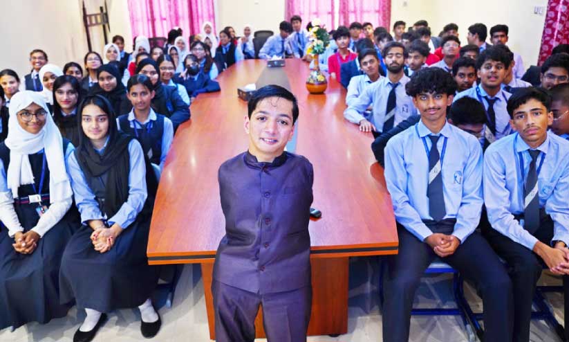 Aasim Velimanna with the students of Noble school