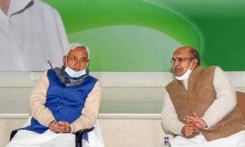 Janata Dal (United) National President and Bihar Chief Minister Nitish Kumar along with party leader K.C. Tyagi. File. | Photo Credit: PTI
