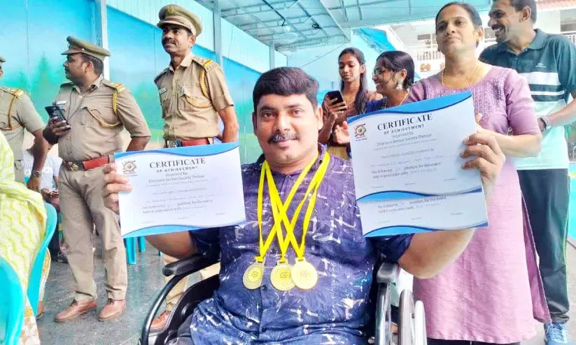 Mansoor with medals